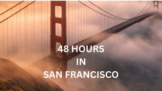 Golden Gate Bridge with fog rolling in — cinematic — upscale travel magazine style