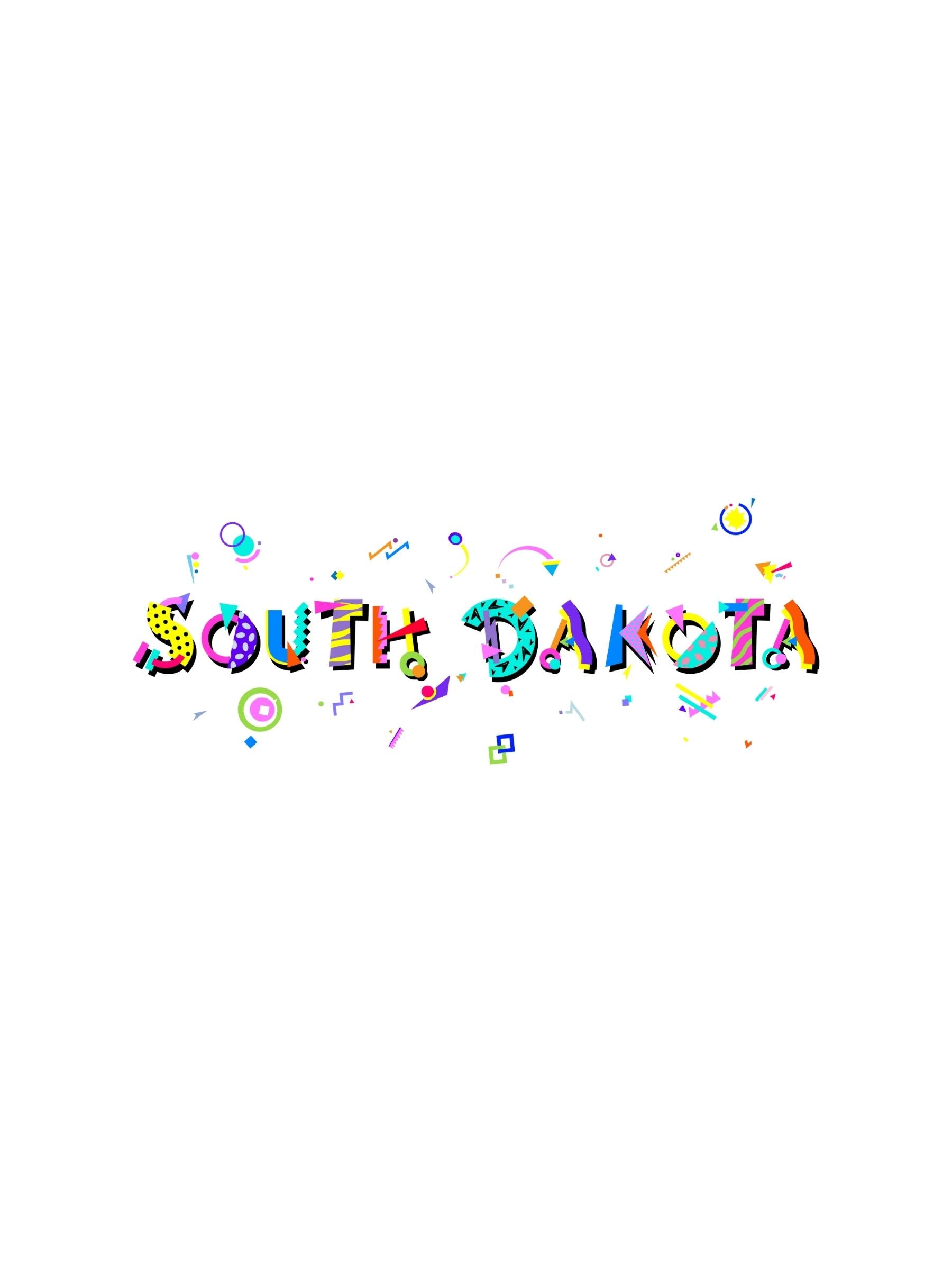 A colorful graphic souvenir t-shirt with 'SOUTH DAKOTA' text in boldmemphis style fonts, featuring various fun shapes and elements